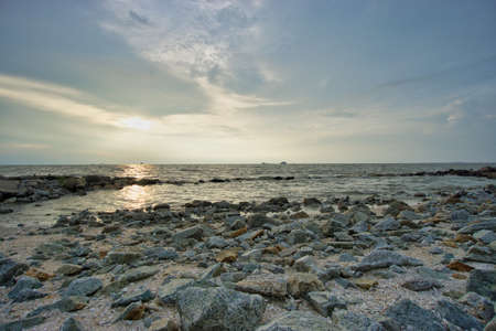 Peaceful beach view and waves during sunset at Jeram, Kuala Selangor Malaysiaの写真素材