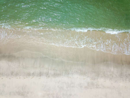 Blue ocean wave on clean sandy beach. Holidays and Travel Conceptの写真素材