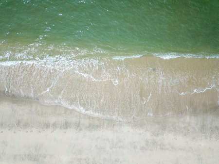 Blue ocean wave on clean sandy beach. Holidays and Travel Conceptの写真素材