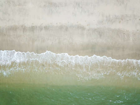 Blue ocean wave on clean sandy beach. Holidays and Travel Conceptの写真素材