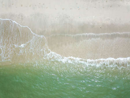 Blue ocean wave on clean sandy beach. Holidays and Travel Conceptの写真素材