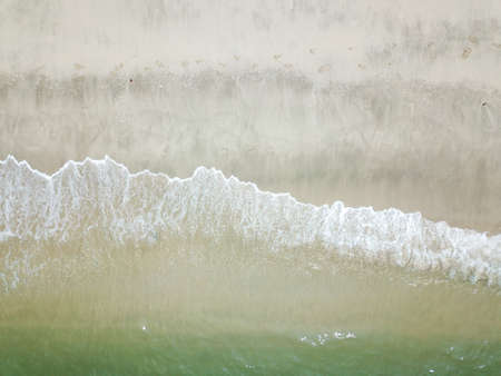Blue ocean wave on clean sandy beach. Holidays and Travel Conceptの写真素材