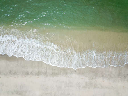 Blue ocean wave on clean sandy beach. Holidays and Travel Conceptの写真素材