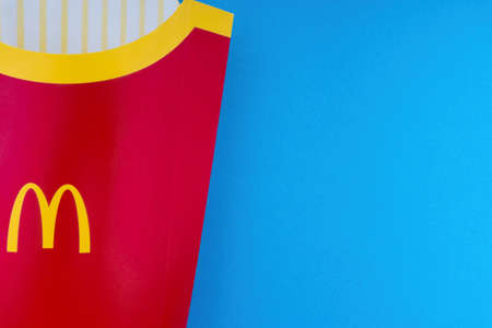 Kuala Lumpur, Malaysia - October 19, 2020 : McDonalds French fries in the French fries box on red...