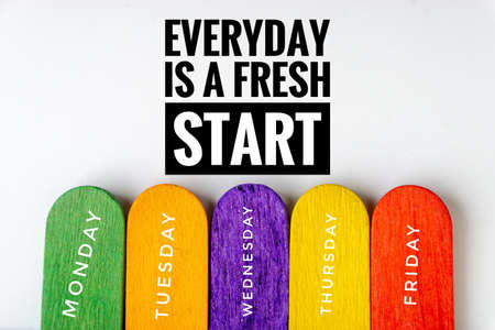 EVERYDAY IS A FRESH START text and colorful wooden stick on white backgroundの写真素材