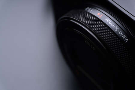 Kuala Lumpur, Malaysia - June 3,2021 : Sony compact or mirrorless camera closeup on black background. Selective focus and crop fragmentのeditorial素材