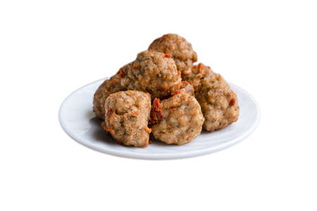 Chicken kofta meatballs mixed with ingredients of onions, garlic fresh herbs and spices mixture on white backgroundの写真素材