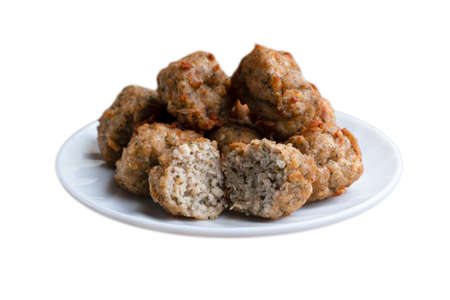 Chicken kofta meatballs mixed with ingredients of onions, garlic fresh herbs and spices mixture on white backgroundの写真素材