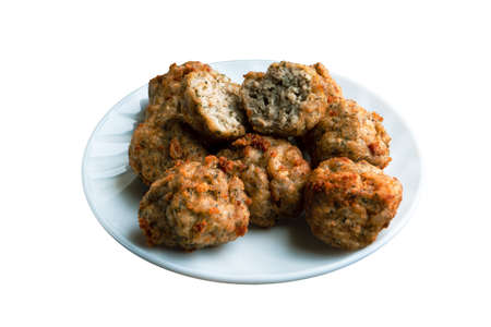Chicken kofta meatballs mixed with ingredients of onions, garlic fresh herbs and spices mixture on white backgroundの写真素材