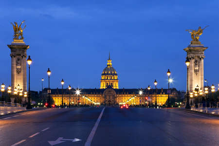The Alexander III bridge and the dome of Invalides at night. Paris, Franceの写真素材