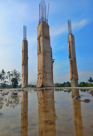 Pillar under construction with blue sky backgroundの写真素材