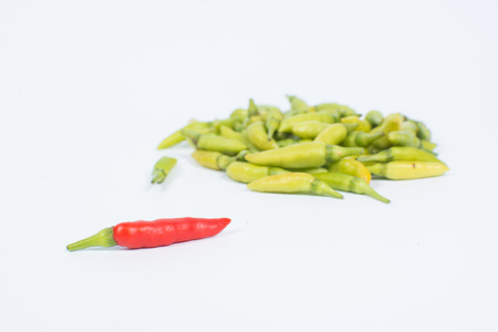 Red and Green chili or Thai chili is a chili pepper on white backgroundの写真素材