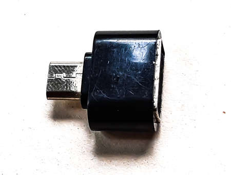 C type O T G connector is on a white background and it is black in color.の写真素材