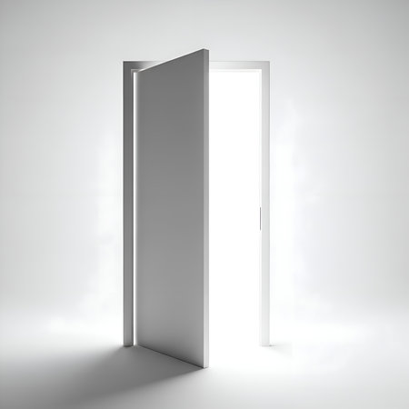 The image depicts a single, open door against a plain, light-colored wall. The door is slightly ajar, revealing a dark, empty space beyond. The simplicity of the scene evokes a senの素材