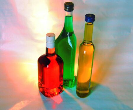three colored bottlesの写真素材