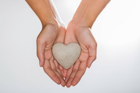 Heart of Stone in handsの写真素材