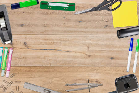 topview on business desk with office tools and utensilsの写真素材