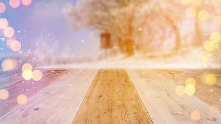 platform made of wood with winter landscape backgroundの写真素材