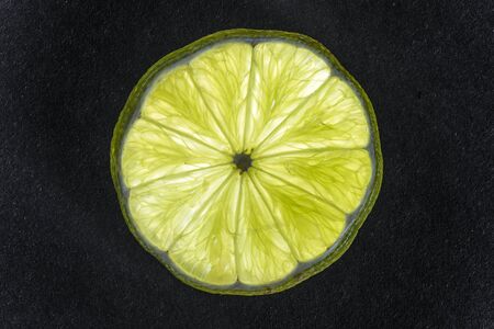 macro of green lime sliceの写真素材