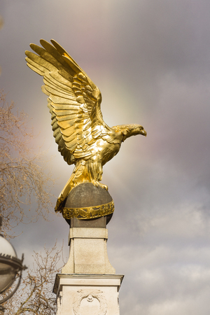 Golden eagle statue as war memorial in London looking at Embankment of river Thamesのeditorial素材