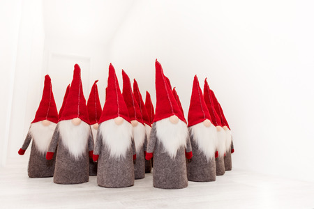 Group of christmas elf with pointed red cap isolated as templateの写真素材