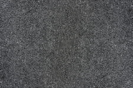 Grey concrete asphalt street floor with grainy texture as backgroundの写真素材