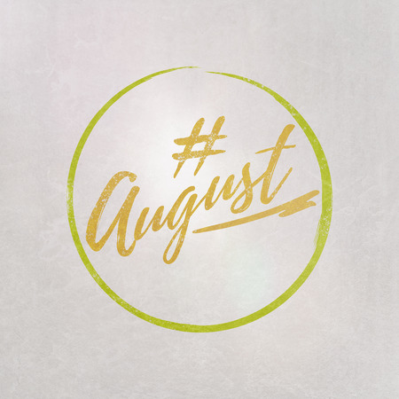 # Hashtag August written in yellow on grey background as template in handwritten style
