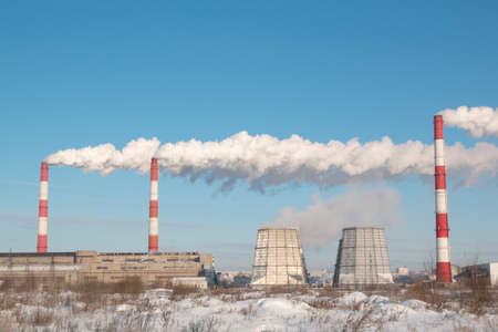 Industrial, ecology and environmental pollution. The smoke from the chimney of the industrial plant.の写真素材