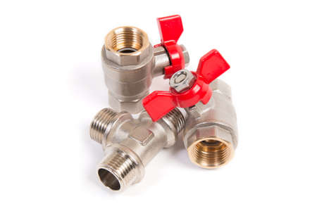 Plumbing gate ball vales, flexible water hose and fittings on a white backgroundの写真素材