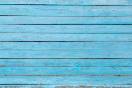 texture wooden background with old cracked blue paintの写真素材