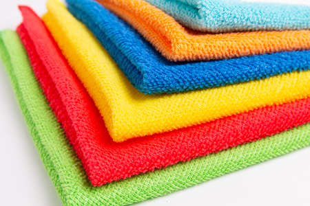 colored microfiber cloths on a white backgroundの写真素材