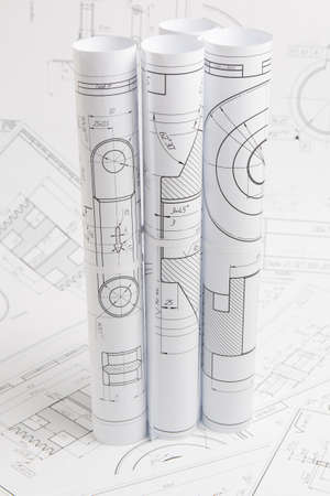 paper engineering drawings of industrial parts and mechanismsの写真素材