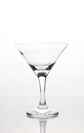 empty glass for martini cocktail on a white backgroundの写真素材