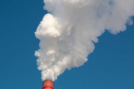 Industrial, ecology and environmental protection. Smoke from the chimney of the industrial plant.の写真素材