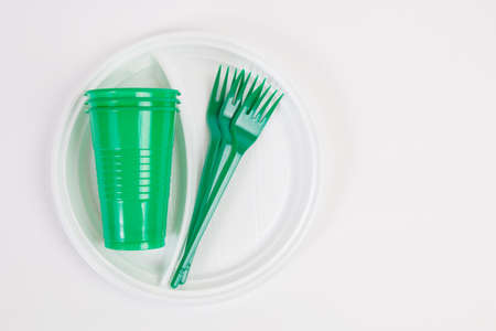 plastic disposable tableware on white backgroundの写真素材