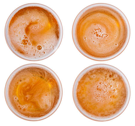 Beer in glass. Beer foam isolated on white background. View from above.の写真素材