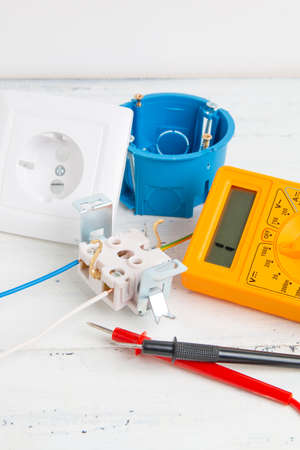digital multimeter, electrical outlet and circuit breakerの写真素材