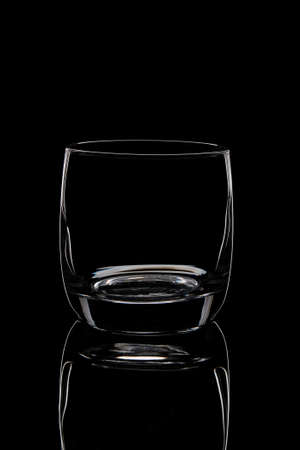 silhouette of an empty glass on a black backgroundの写真素材