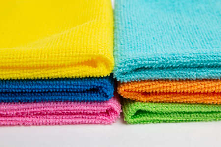 colored microfiber cloths on a white backgroundの写真素材