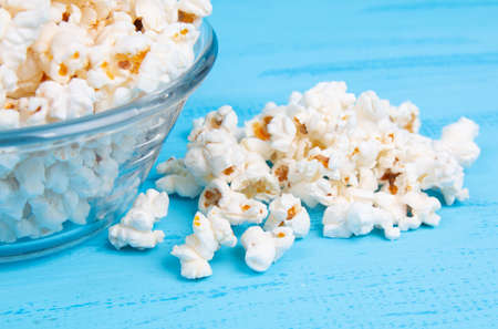 close up popcorn on a blue tableの写真素材