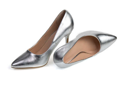 womens silver classic shoes on a white backgroundの写真素材