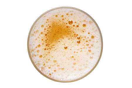 Beer in glass. Beer foam isolated on white background. View from above.の写真素材