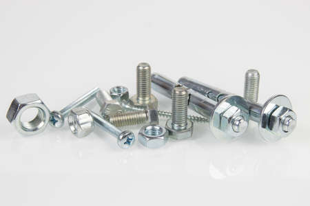 bolt and nut isolated on white backgroundの写真素材