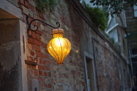 Antique glass lamp in Veniceの写真素材
