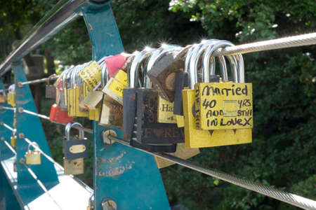 Padlocks as symbol of love on bridge at Bakewell, Peak Districtのeditorial素材