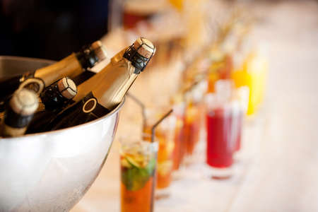 Champagne bottles in bucketの写真素材