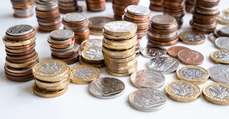 English money, coins of pounds and penniesの写真素材