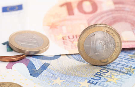 Euro money close-up, image includes coins and banknotesの写真素材