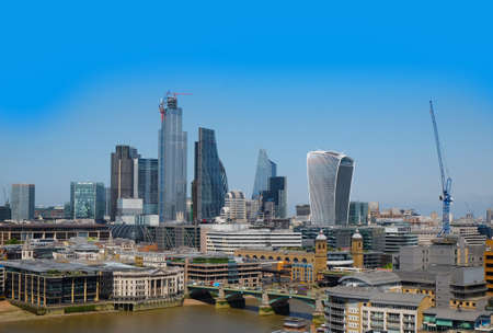City of London, United Kingdom 6th July 2019: London skyline seen from south bank, river Thames in...