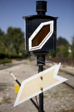 Railway traffic sign and old rails blue sky verticalの写真素材